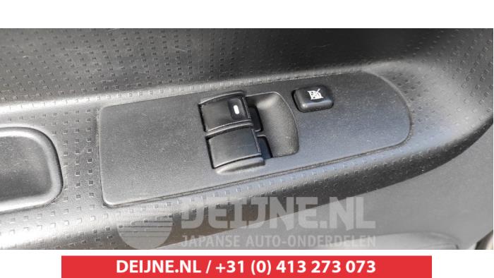 Multi-functional window switch from a Mitsubishi Colt (Z2/Z3) 1.1 12V 2008