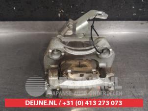 Used Rear brake calliper, left Toyota Prius (ZVW5) 1.8 16V Hybrid Price on request offered by V.Deijne Jap.Auto-onderdelen BV