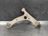 Front lower wishbone, right from a Toyota Corolla (E12) 1.4 16V VVT-i 2002