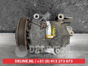 Used Air conditioning pump Nissan Primera Wagon (W12) 1.8 16V Price € 45,00 Margin scheme offered by V.Deijne Jap.Auto-onderdelen BV