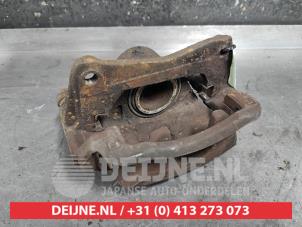 Used Front brake calliper, left Toyota Corolla (EB/WZ/CD) 1.6 16V VVT-i Price € 25,00 Margin scheme offered by V.Deijne Jap.Auto-onderdelen BV