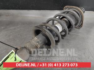 Used Rear shock absorber rod, left Honda Civic (EP/EU) 1.4 16V Price € 35,00 Margin scheme offered by V.Deijne Jap.Auto-onderdelen BV