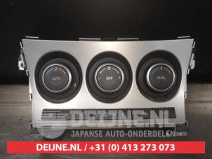 Używane Panel sterowania nagrzewnicy Mazda 3 Sport (BL14/BLA4/BLB4) 2.0i MZR DISI 16V Cena na żądanie oferowane przez V.Deijne Jap.Auto-onderdelen BV