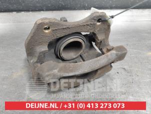Used Front brake calliper, right Nissan Almera (N16) 1.5 16V Price € 35,00 Margin scheme offered by V.Deijne Jap.Auto-onderdelen BV
