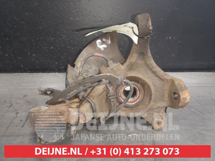 Knuckle, front right from a Hyundai i20 1.4i 16V 2009