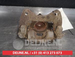 Used Front brake calliper, left Daihatsu Sirion 2 (M3) 1.0 12V DVVT Price € 35,00 Margin scheme offered by V.Deijne Jap.Auto-onderdelen BV