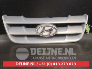 Usagé Calandre Hyundai Matrix 1.6 16V Prix sur demande proposé par V.Deijne Jap.Auto-onderdelen BV
