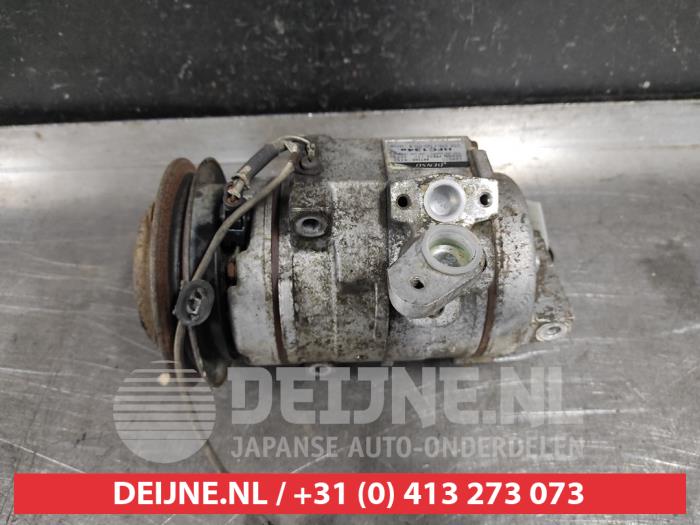 Usagé Pompe clim Mitsubishi Pajero Hardtop (V6/7) 3.2 DI-D 16V Prix € 125,00 Règlement à la marge proposé par V.Deijne Jap.Auto-onderdelen BV