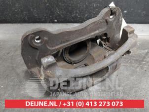 Used Front brake calliper, left Mitsubishi L-200 2.4 Clean Diesel 4WD Price € 50,00 Margin scheme offered by V.Deijne Jap.Auto-onderdelen BV