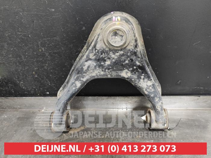 Front upper wishbone, right from a Mitsubishi L-200 2.4 Clean Diesel 4WD 2017