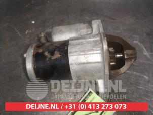 Starter from a Mazda 2 (DE) 1.3 16V S-VT 2008