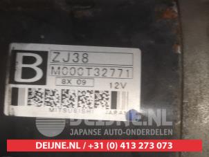 Starter from a Mazda 2 (DE) 1.3 16V S-VT 2008