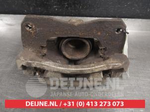 Used Front brake calliper, left Toyota Camry (CV30) 2.4i 16V VVT-i Price € 35,00 Margin scheme offered by V.Deijne Jap.Auto-onderdelen BV
