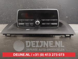 Used Radio control panel Mazda 3 (BM/BN) 1.5 Skyactiv-G 100 16V Price on request offered by V.Deijne Jap.Auto-onderdelen BV