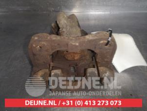 Used Rear brake calliper, left Honda Civic (EP/EU) 1.6 16V VTEC Price € 25,00 Margin scheme offered by V.Deijne Jap.Auto-onderdelen BV