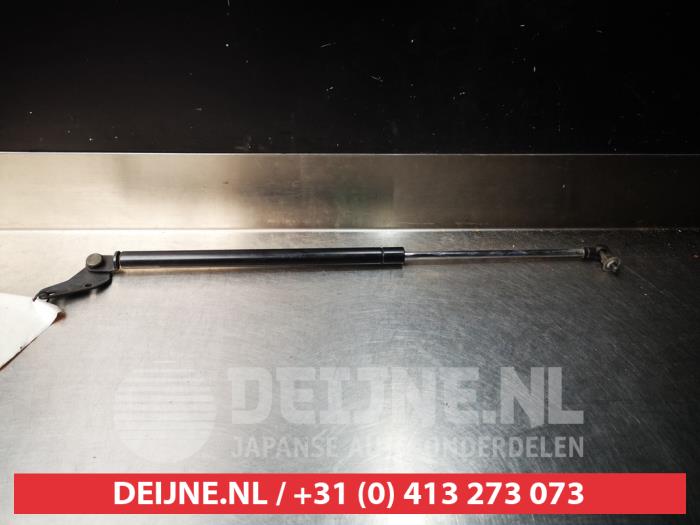 Rear gas strut, left from a Daihatsu YRV (M2) 1.3 16V DVVT 2002