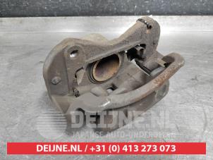 Used Front brake calliper, left Kia Sportage (SL) 2.0 CVVT 16V 4x4 Price € 45,00 Margin scheme offered by V.Deijne Jap.Auto-onderdelen BV