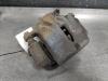 Front brake calliper, left from a Kia Sportage (SL) 2.0 CVVT 16V 4x4 2013