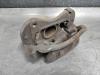 Front brake calliper, left from a Kia Sportage (SL) 2.0 CVVT 16V 4x4 2013