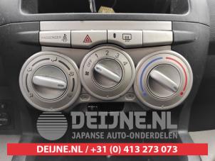 Używane Panel sterowania nagrzewnicy Daihatsu Sirion 2 (M3) 1.0 12V DVVT Cena na żądanie oferowane przez V.Deijne Jap.Auto-onderdelen BV