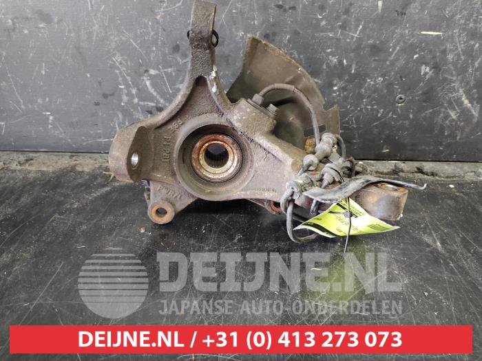 Knuckle, front left from a Hyundai i20 1.2i 16V 2010