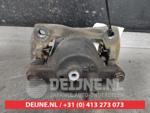 Used Front brake calliper, left Toyota Yaris Verso (P2) 1.3 16V Price € 30,00 Margin scheme offered by V.Deijne Jap.Auto-onderdelen BV