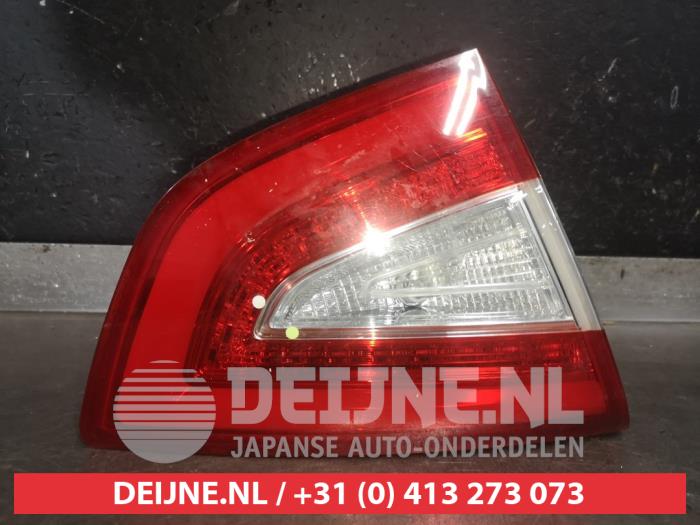 Tailgate reflector, left from a Hyundai iX35 (LM) 1.6 GDI 16V 2014