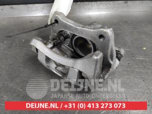 Used Front brake calliper, left Nissan Micra (K14) 1.0 IG-T 92 Price € 50,00 Margin scheme offered by V.Deijne Jap.Auto-onderdelen BV