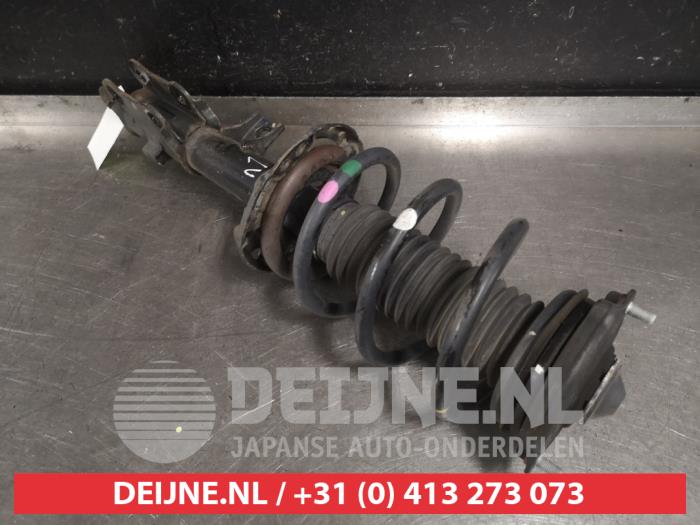 Front shock absorber rod, left from a Hyundai Tucson (TL) 1.6 GDi 16V 2WD 2018