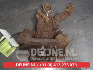 Used Rear brake calliper, left Suzuki Swift (ZA/ZC/ZD1/2/3/9) 1.6 Sport VVT 16V Price € 75,00 Margin scheme offered by V.Deijne Jap.Auto-onderdelen BV