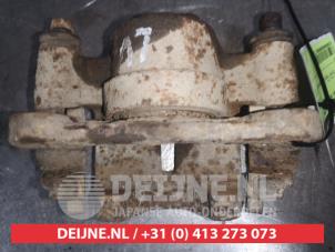 Used Front brake calliper, left Suzuki Jimny Hardtop 1.3i 16V 4x4 Price on request offered by V.Deijne Jap.Auto-onderdelen BV