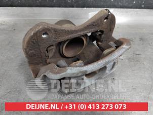 Used Front brake calliper, left Kia Sportage (SL) 2.0 CVVT 16V 4x2 Price € 45,00 Margin scheme offered by V.Deijne Jap.Auto-onderdelen BV