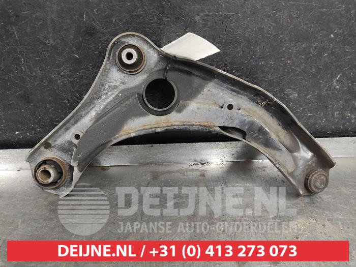 Front lower wishbone, left from a Nissan Micra (K14) 1.0 IG-T 100 2019