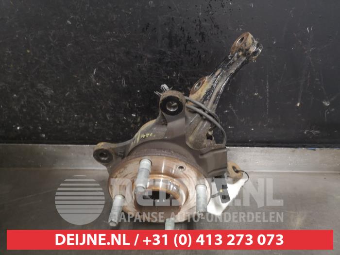 Knuckle, front left from a Hyundai i10 1.0 12V 2021
