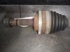 Front drive shaft, left from a Toyota Yaris (P1) 1.3 16V VVT-i 2001