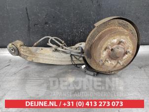 Used Knuckle, rear left Hyundai Santa Fe I 2.0 16V 4x2 Price on request offered by V.Deijne Jap.Auto-onderdelen BV