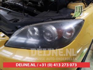 Używane Reflektor lewy Mazda 3 Sport (BK14) 1.6i 16V Cena € 75,00 Procedura marży oferowane przez V.Deijne Jap.Auto-onderdelen BV