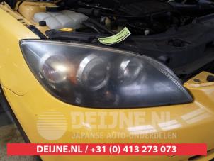 Używane Reflektor prawy Mazda 3 Sport (BK14) 1.6i 16V Cena € 75,00 Procedura marży oferowane przez V.Deijne Jap.Auto-onderdelen BV