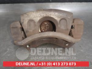 Used Front brake calliper, right Kia Sportage (SL) 2.0 CVVT 16V 4x2 Price € 35,00 Margin scheme offered by V.Deijne Jap.Auto-onderdelen BV