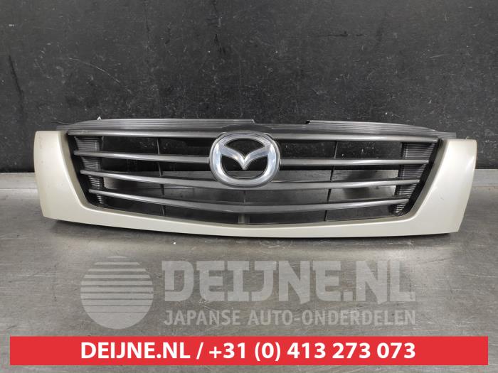 Używane Grill Mazda B (UJ/UN) 2.5 TDiC 4x4 Cena na żądanie oferowane przez V.Deijne Jap.Auto-onderdelen BV