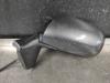 Wing mirror, left from a Toyota Auris (E15) 1.4 D-4D-F 16V 2007