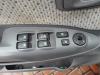 Interruptor combinado de ventanillas de un Hyundai Tucson (JM), 2004 / 2010 2.0 16V CVVT 4x2, SUV, Gasolina, 1.975cc, 104kW (141pk), FWD, G4GC, 2004-08 / 2010-12, JMAD 2005