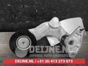 Spanrolle multiriem van een Kia Niro II (SG2) 1.6 GDI Hybrid 2023