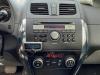 Radio from a Suzuki SX4 (EY/GY), 2006 1.6 16V 4x2, SUV, Petrol, 1.590cc, 88kW (120pk), FWD, M16AVVT, 2009-07, EYA21; GYA21 2010