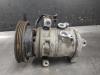 Air conditioning pump from a Nissan Pixo (D31S), 2009 1.0 12V, Hatchback, Petrol, 996cc, 50kW (68pk), FWD, K10B, 2009-03, HFD31S 2011