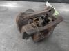 Rear brake calliper, left from a Kia Sportage (SL), 2010 / 2016 1.6 GDI 16V 4x2, Jeep/SUV, Petrol, 1 591cc, 99kW (135pk), FWD, G4FD, 2010-06 / 2015-12, SLSF5P21; SLSF5P31 2015