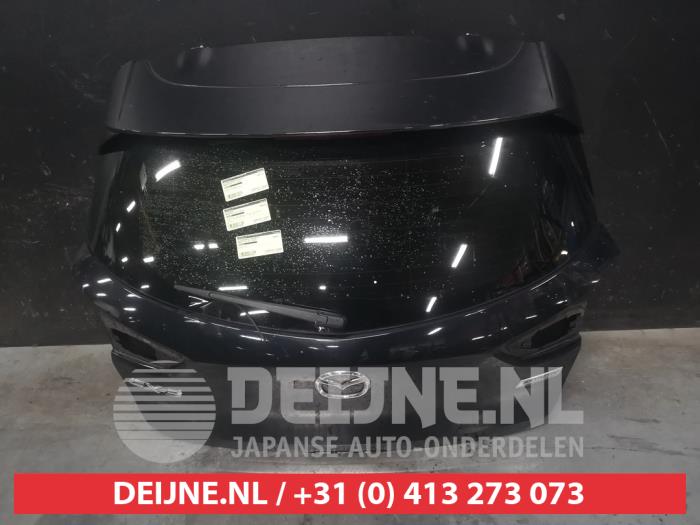 Używane Tylna klapa Mazda CX-3 (DJ/DK) 2.0 SkyActiv-G 120 Cena € 600,00 Procedura marży oferowane przez V.Deijne Jap.Auto-onderdelen BV