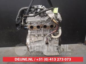 Engine from a Toyota Yaris III (P13) 1.5 16V Hybrid 2014