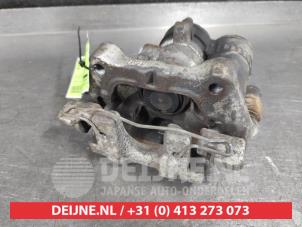 Używane Zacisk hamulcowy lewy tyl Mazda CX-30 (DM) 2.0 e-SkyActiv X 186 M Hybrid 16V Cena na żądanie oferowane przez V.Deijne Jap.Auto-onderdelen BV
