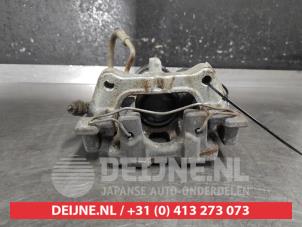 Używane Zacisk hamulcowy lewy tyl Mazda CX-30 (DM) 2.0 e-SkyActiv-G 122 16V Cena na żądanie oferowane przez V.Deijne Jap.Auto-onderdelen BV